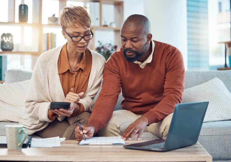 Couple working on financial budget