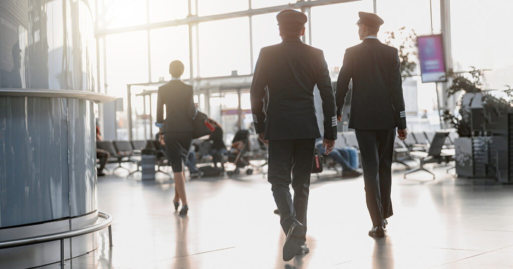 Pilots walking in airport