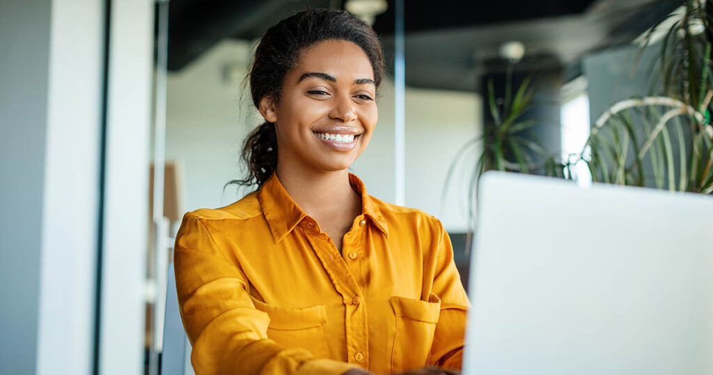 Woman selects benefits during open enrollment