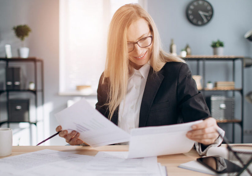 Business owner reviews the seven documents she needs