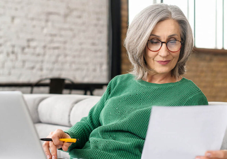 Woman reviews a list of what expenses Medicare does or does not cover