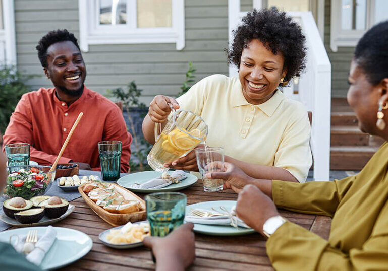 Family enjoys outdoor dinner together