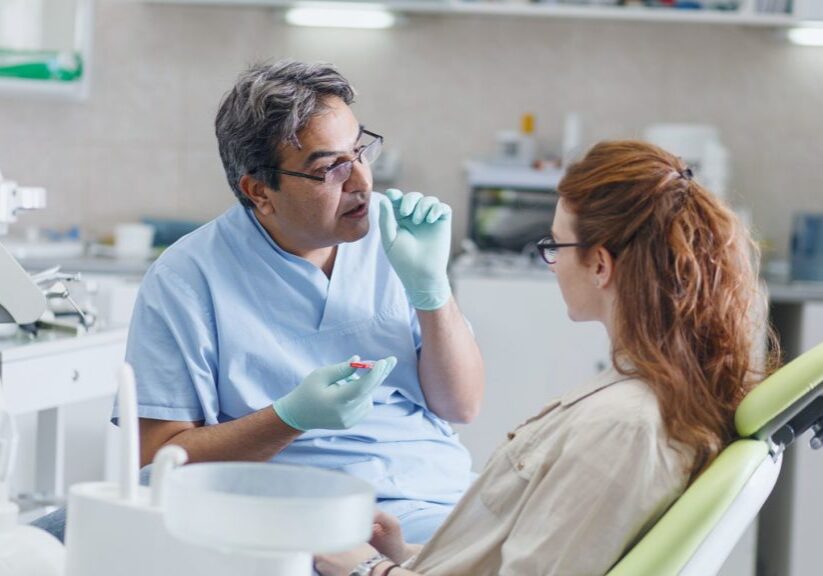 Dentist with patient