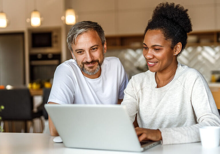 Couple evaluates their investment portfolio