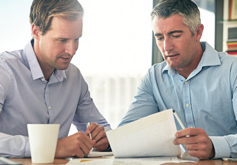Tax advisor going through tax credit application with client