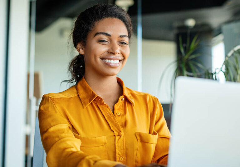 Woman selects benefits during open enrollment